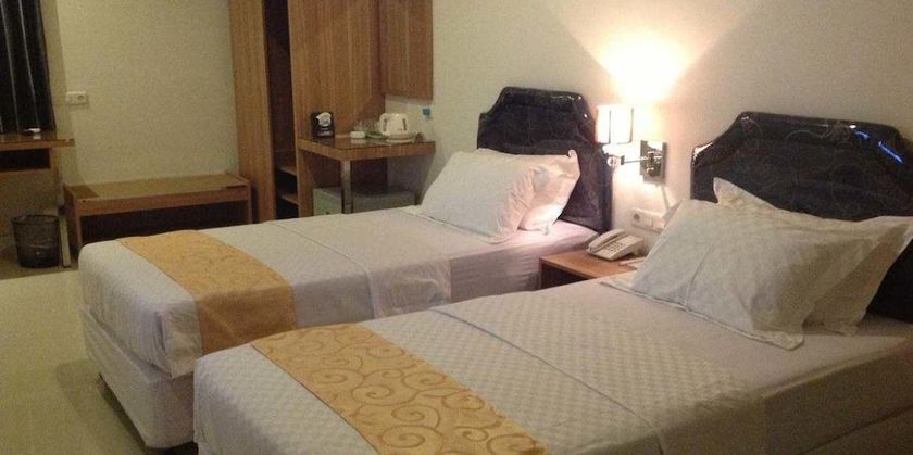 Imagen de la habitación del Hotel Pacific Makassar. Foto 11