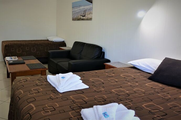 Imagen de la habitación del Hotel Pacific Palms Motor Inn. Foto 11