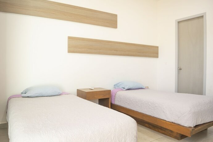 Imagen de la habitación del Hotel Pacifika Apartments. Foto 14