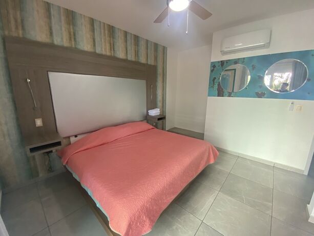 Imagen de la habitación del Hotel Pacifika Apartments. Foto 18