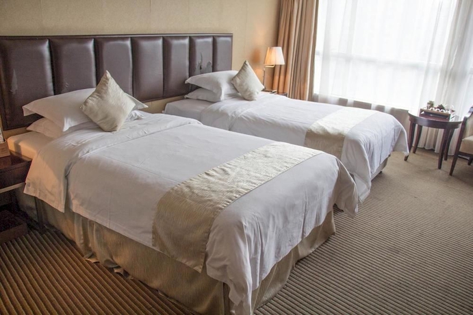 Imagen de la habitación del Hotel Paco Business Baiyun. Foto 4