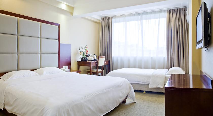 Imagen de la habitación del Hotel Paco Business Hotel - Jiangtai Road. Foto 2
