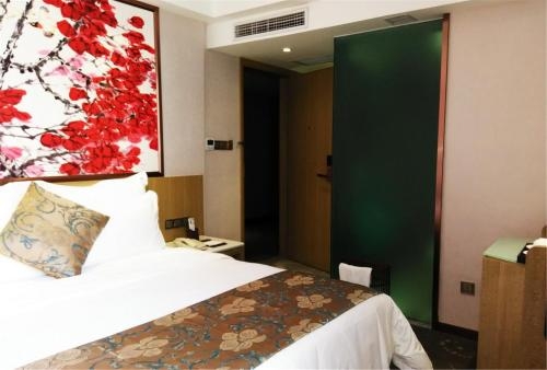 Imagen de la habitación del Hotel Paco Business Shunde Beijiao. Foto 6
