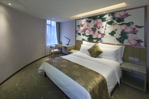 Imagen de la habitación del Hotel Paco Business Shunde Beijiao. Foto 9