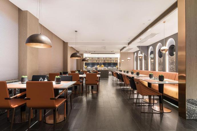 Imagen del bar/restaurante del Hotel Paco (Canton Tower Pazhou). Foto 3