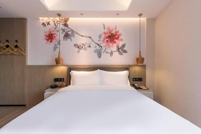 Imagen de la habitación del Hotel Paco (Canton Tower Pazhou). Foto 4