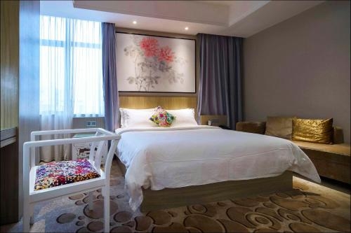 Imagen de la habitación del Hotel Paco Guangzhou Dongfeng Road Branch. Foto 6