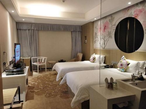 Imagen de la habitación del Hotel Paco Guangzhou Dongfeng Road Branch. Foto 7