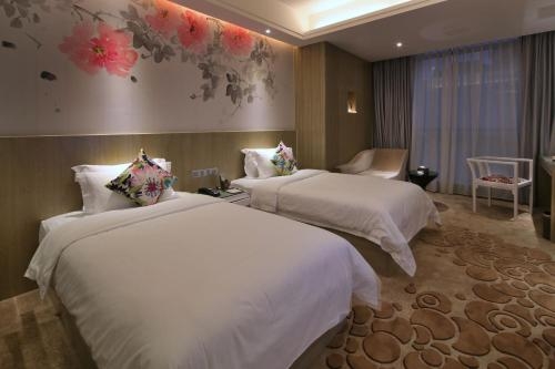 Imagen de la habitación del Hotel Paco Guangzhou Dongfeng Road Branch. Foto 10