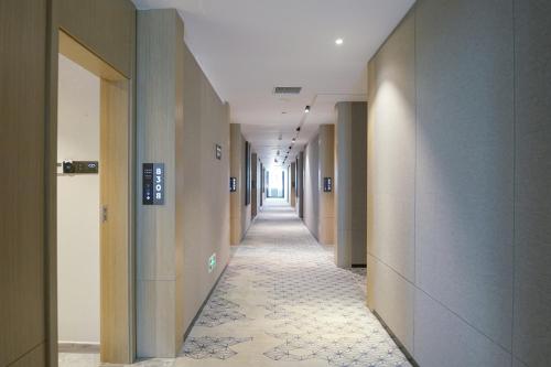 Imagen de la habitación del Hotel Paco Guangzhou North Railway Station. Foto 15