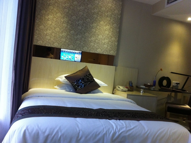 Imagen de la habitación del Hotel Paco Guangzhou Ouzhuang Metro Branch. Foto 7