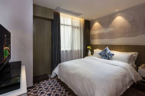 Imagen de la habitación del Hotel Paco Guangzhou Tianhe North Shuiyin Road. Foto 4