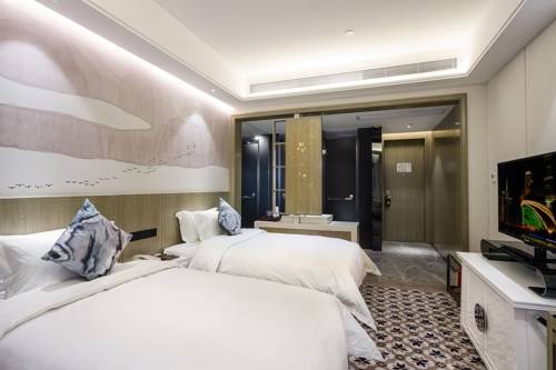 Imagen de la habitación del Hotel Paco Guangzhou Tianhe North Shuiyin Road. Foto 5
