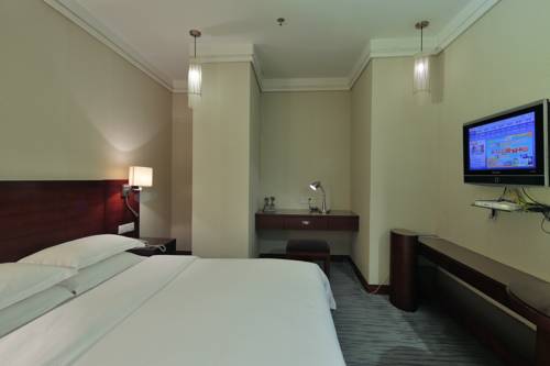 Imagen de la habitación del Hotel Paco Guangzhou Zhujiang New Town Branch. Foto 3