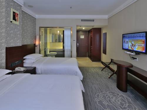 Imagen de la habitación del Hotel Paco Guangzhou Zhujiang New Town Branch. Foto 10