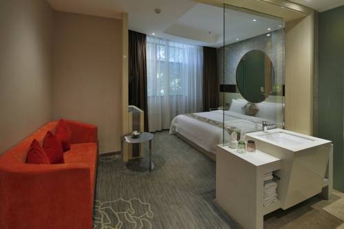 Imagen de la habitación del Hotel Paco Guangzhou Zhujiang New Town Branch. Foto 11