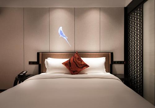 Imagen de la habitación del Hotel Paco Guangzhou Zoo Metro Branch. Foto 4