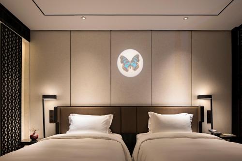 Imagen de la habitación del Hotel Paco Guangzhou Zoo Metro Branch. Foto 6