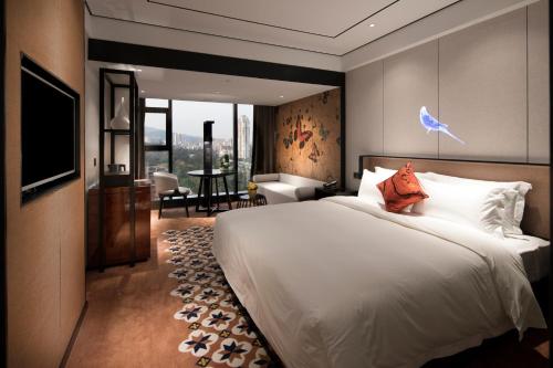 Imagen de la habitación del Hotel Paco Guangzhou Zoo Metro Branch. Foto 7