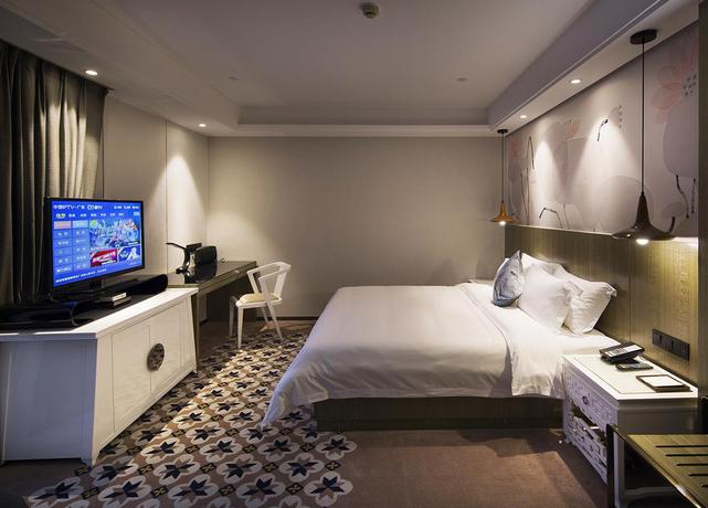 Imagen de la habitación del Hotel Paco Hotel Gangding Metro Guangzhou. Foto 6