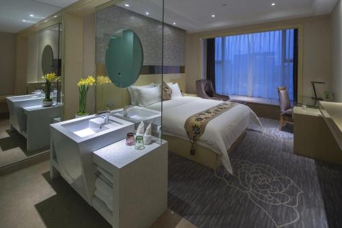 Imagen de la habitación del Hotel Paco Hotel Suyuan Metro Guangzhou. Foto 9