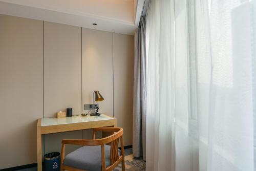 Imagen de la habitación del Hotel Paco Shenzhen Luohu Port. Foto 15