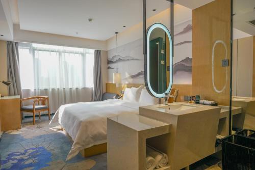 Imagen de la habitación del Hotel Paco Shenzhen Luohu Port. Foto 17