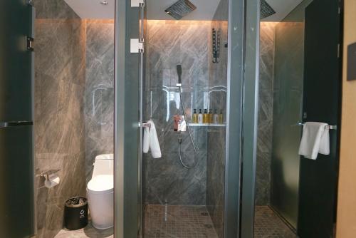 Imagen de la habitación del Hotel Paco Shenzhen Luohu Port. Foto 18