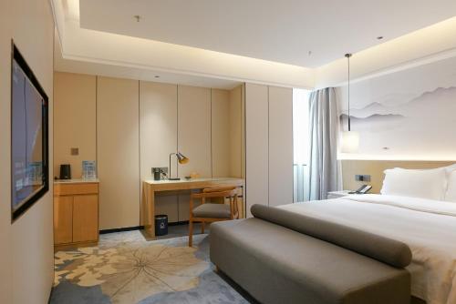 Imagen de la habitación del Hotel Paco Shenzhen Luohu Port. Foto 19