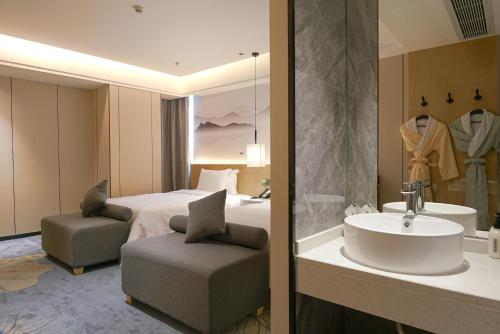 Imagen de la habitación del Hotel Paco Shenzhen Luohu Port. Foto 20