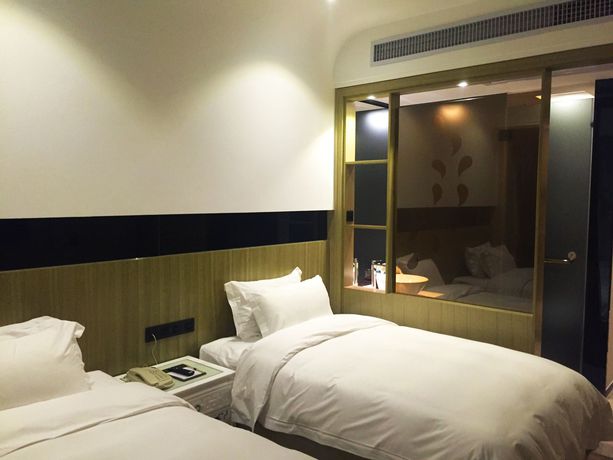 Imagen de la habitación del Hotel Paco Tiyuxilu Metro Guangzhou. Foto 8