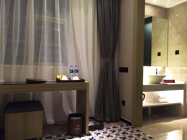 Imagen de la habitación del Hotel Paco Tiyuxilu Metro Guangzhou. Foto 11