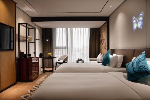 Imagen general del Hotel Paco Ya Zhanjiang Guomao People\'s Square. Foto 1