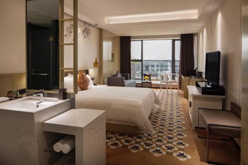 Imagen general del Hotel Paco Ya Zhanjiang Guomao People\'s Square. Foto 8