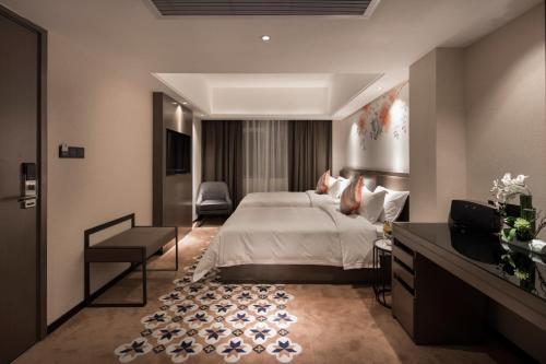 Imagen de la habitación del Hotel Paco(guangzhou Dongpu Branch). Foto 9