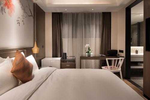 Imagen general del Hotel Paco(guangzhou Dongpu Branch). Foto 1