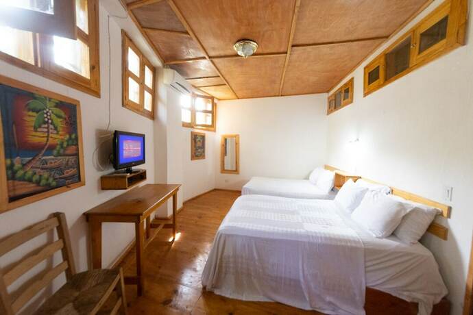 Imagen de la habitación del Hotel Pacot Breeze. Foto 19