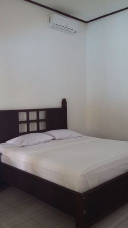Imagen de la habitación del Hotel Padang Lovina Sea Side Cottage. Foto 3