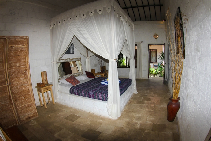 Imagen de la habitación del Hotel Padang Padang Breeze. Foto 8