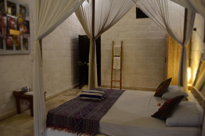 Imagen de la habitación del Hotel Padang Padang Breeze. Foto 9