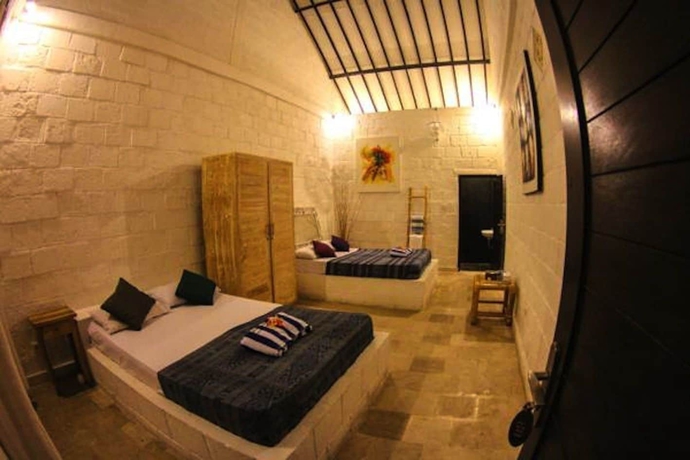 Imagen de la habitación del Hotel Padang Padang Breeze. Foto 13