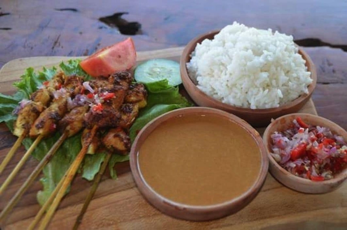 Imagen del bar/restaurante del Hotel Padang Padang Breeze. Foto 3