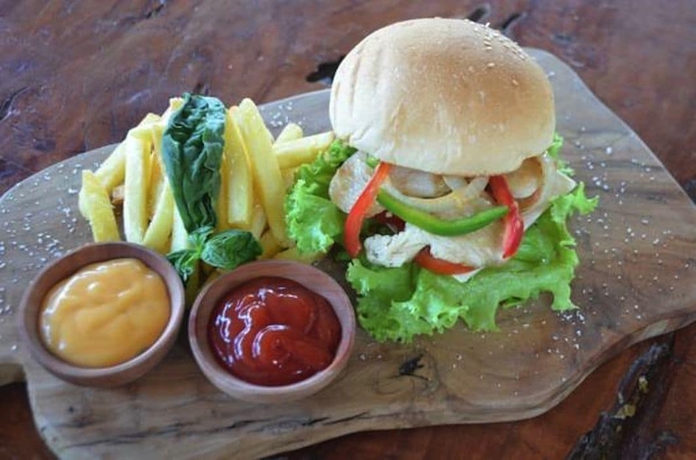 Imagen del bar/restaurante del Hotel Padang Padang Breeze. Foto 7