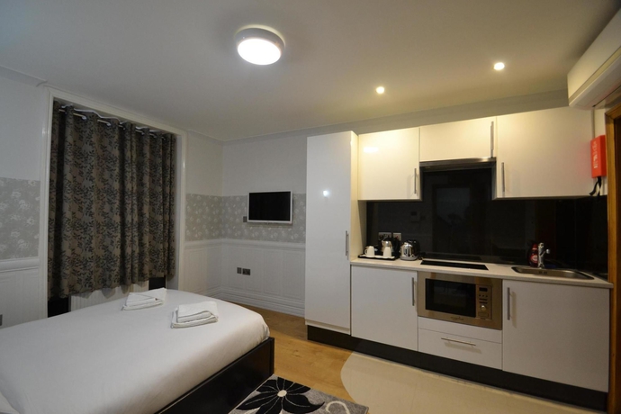 Imagen de la habitación del Hotel Paddington Apartments. Foto 3