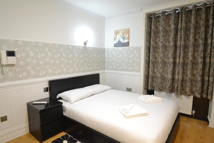 Imagen de la habitación del Hotel Paddington Apartments. Foto 5