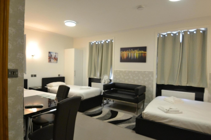 Imagen de la habitación del Hotel Paddington Apartments. Foto 6