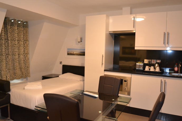 Imagen de la habitación del Hotel Paddington Apartments. Foto 8