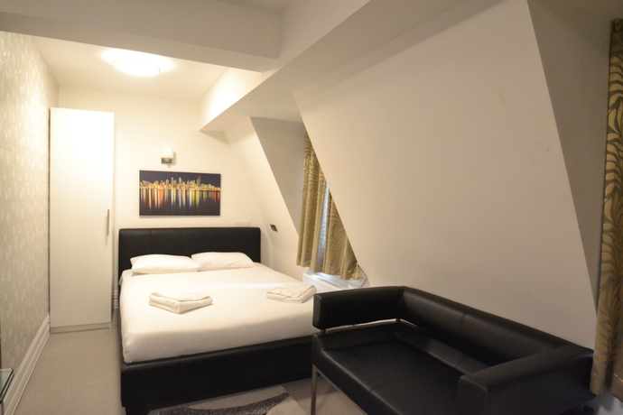 Imagen de la habitación del Hotel Paddington Apartments. Foto 10