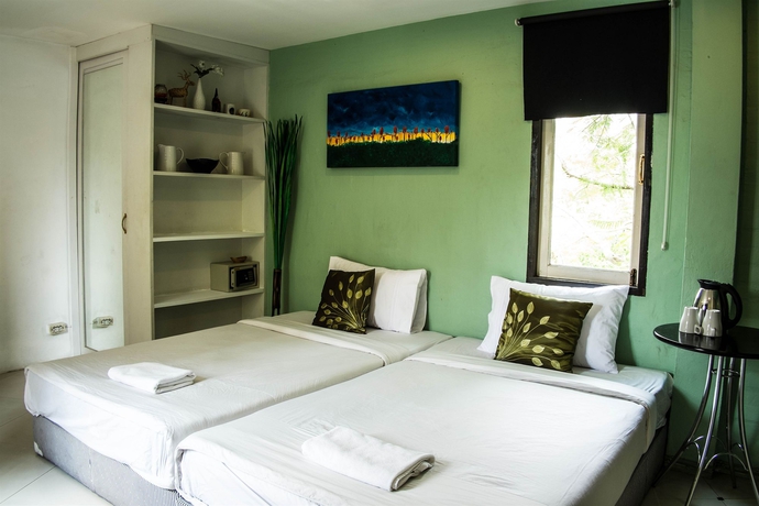 Imagen de la habitación del Hotel Padi Madi Guest House. Foto 11