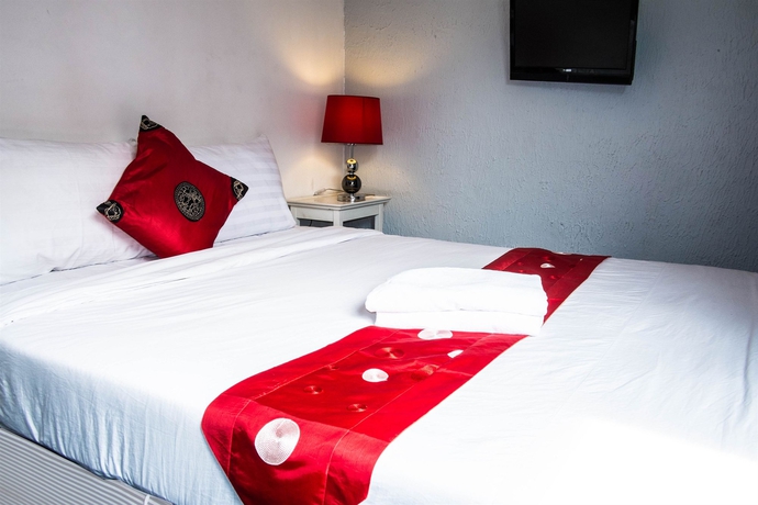 Imagen de la habitación del Hotel Padi Madi Guest House. Foto 14